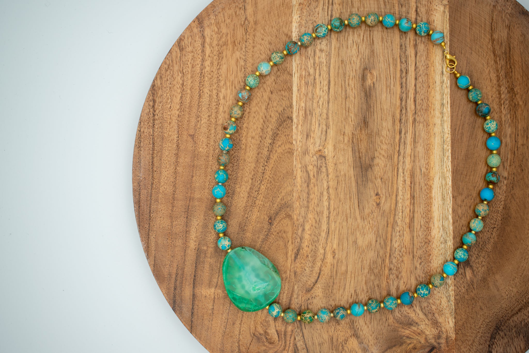 Bahama Breeze necklaces lying on table