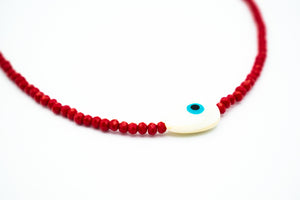 closeup of Evil Eye protection necklace