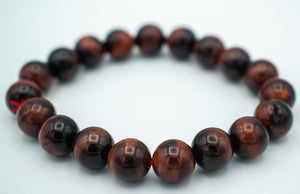 closeup of Emanuel Dark Healing stones bracelets