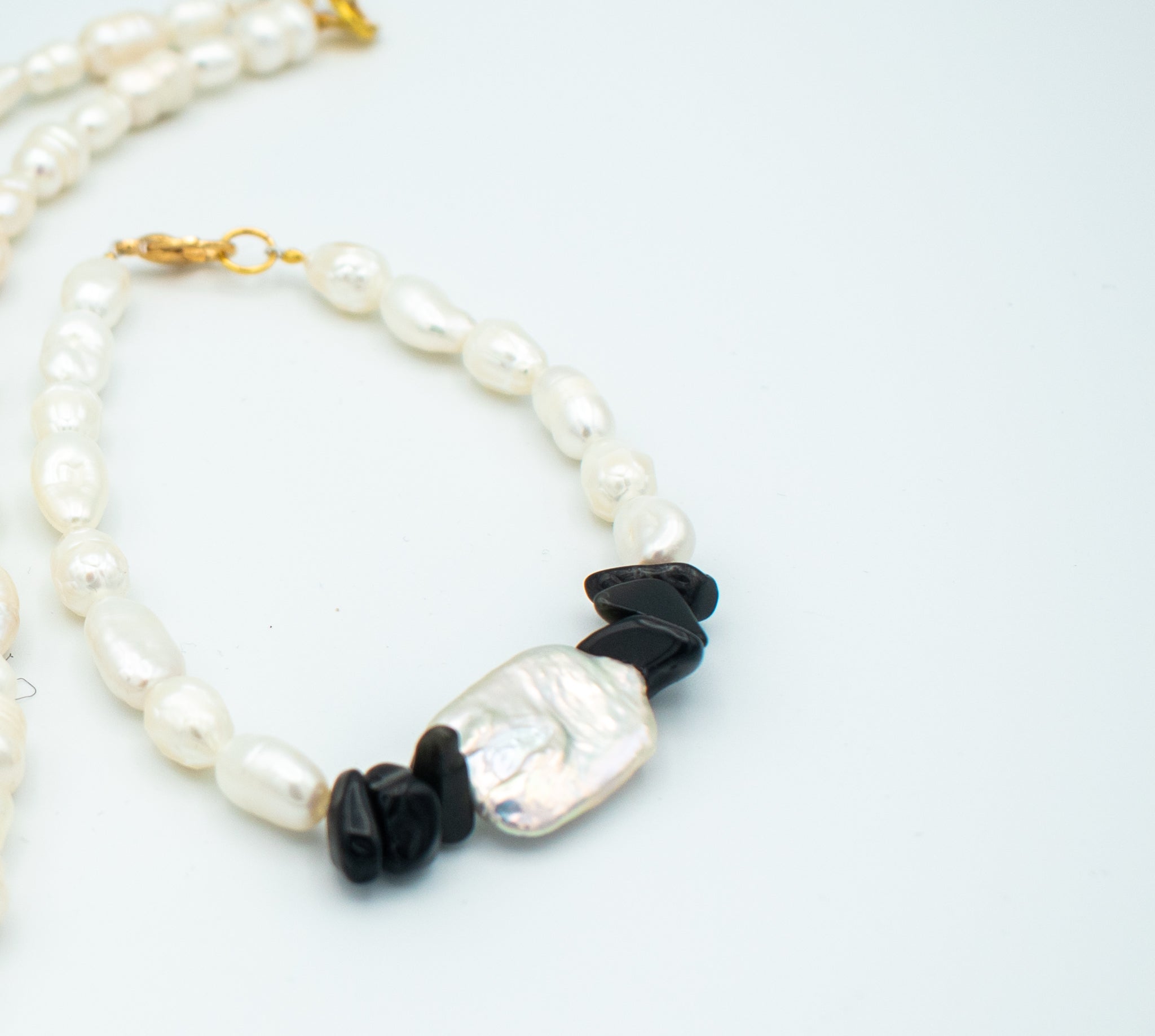 Emanuel Health Black Beads With A Touch Of Blue And White Necklace