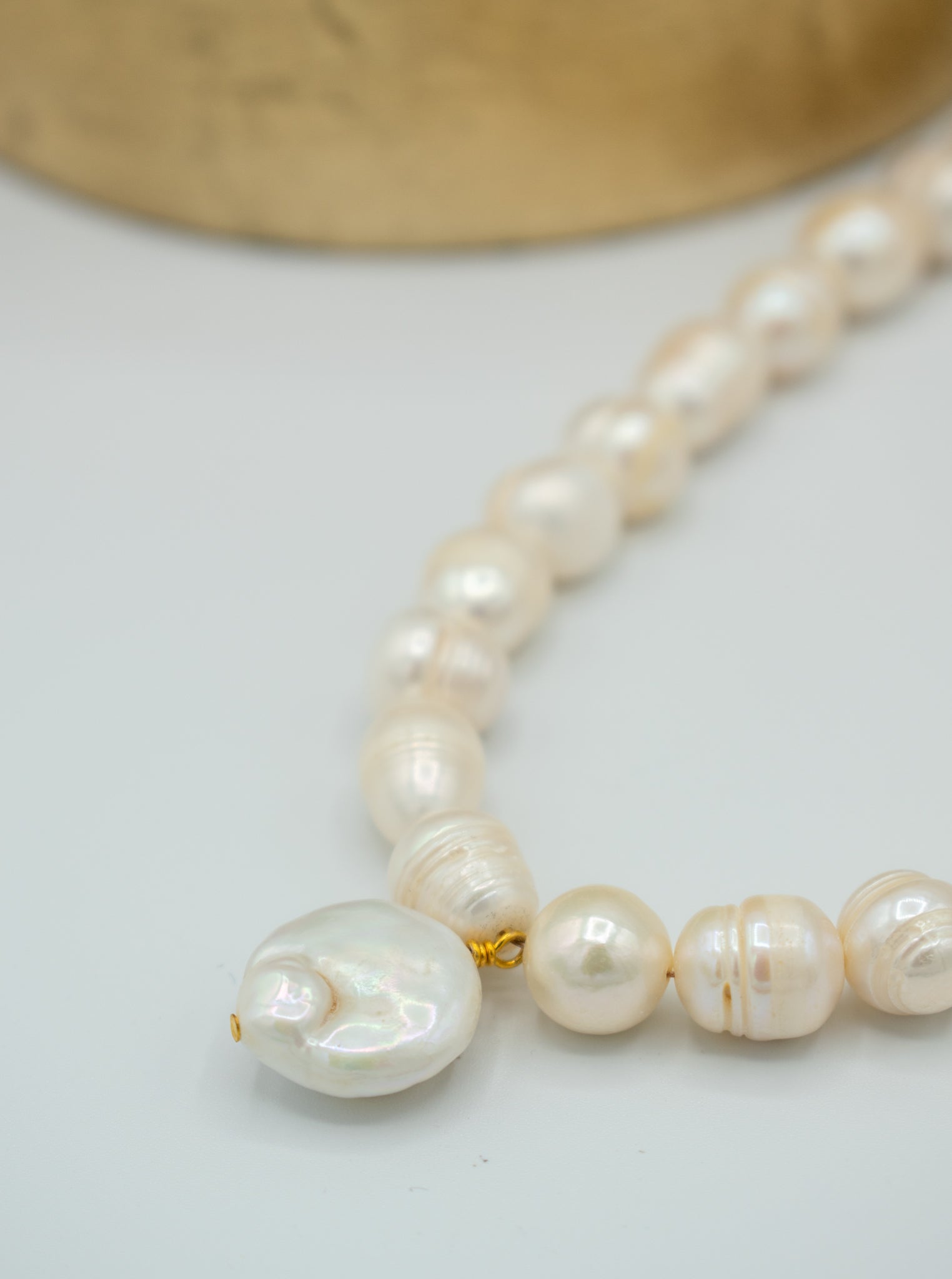 closeup of Pearl pendant necklace