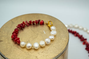 Lava & Ice Ocean Red Bracelet lying on a stool 