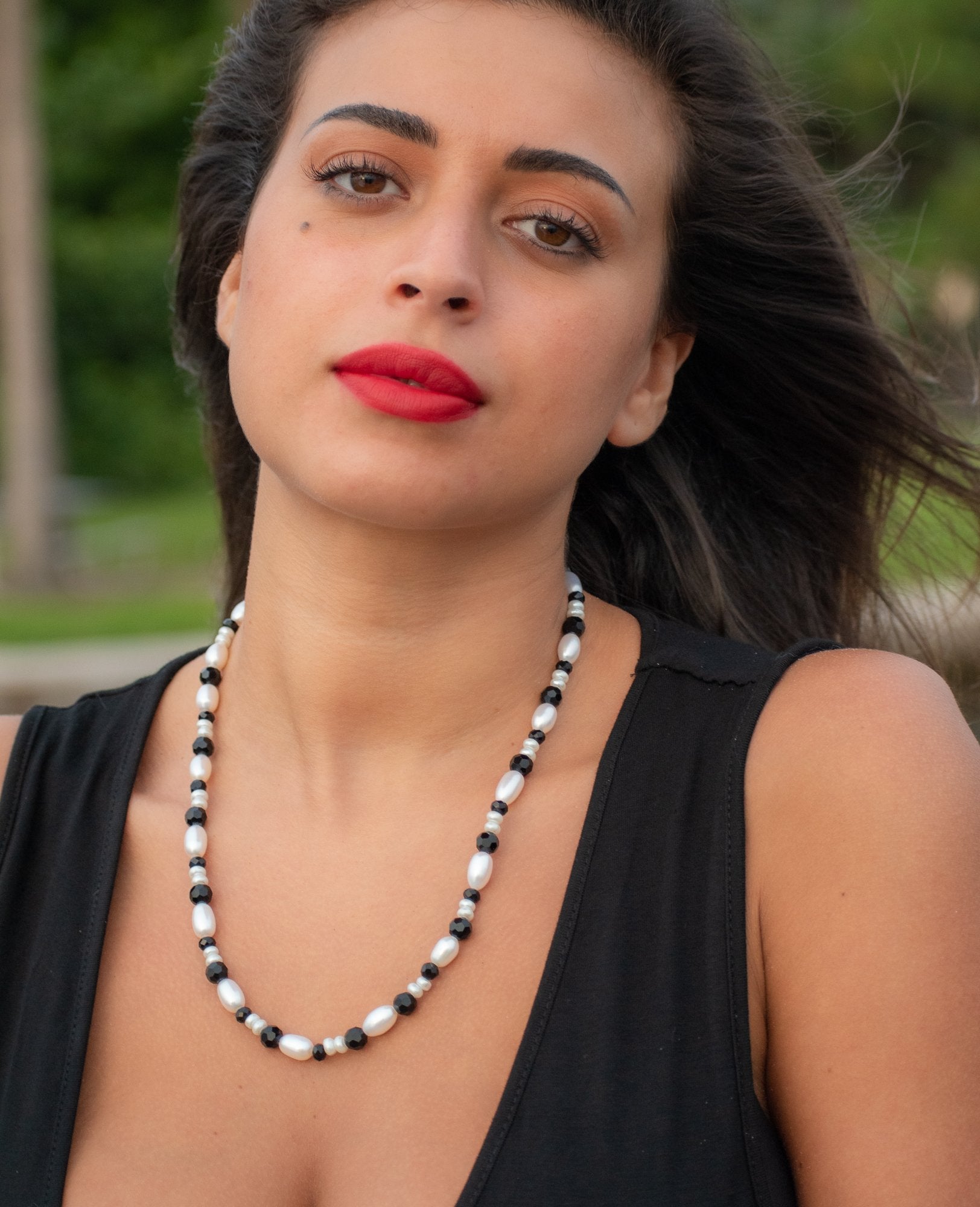 woman wearing Bow-Tie Dirty Martini Pearl Necklace